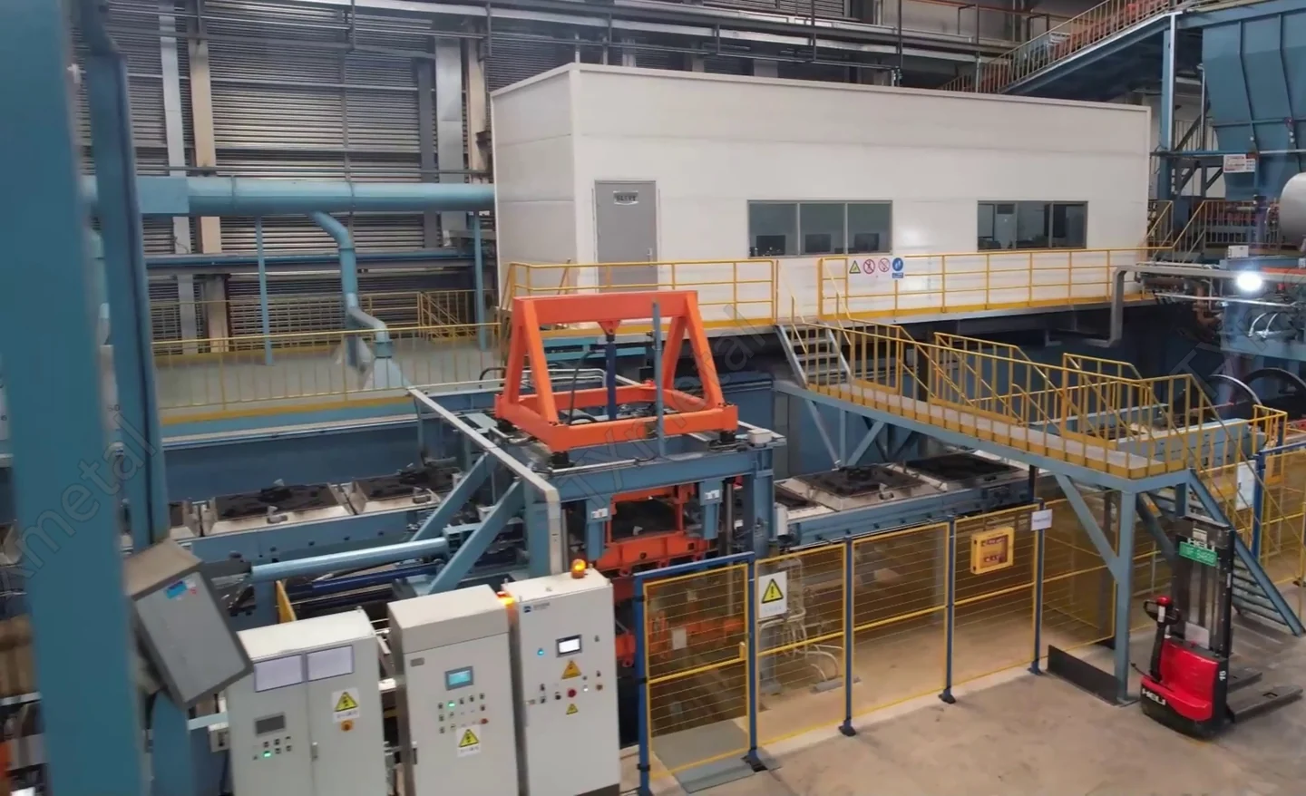 Automatic flaskless horizontal sand molding line and control room for gray iron, ductile iron, and ADI casting production.