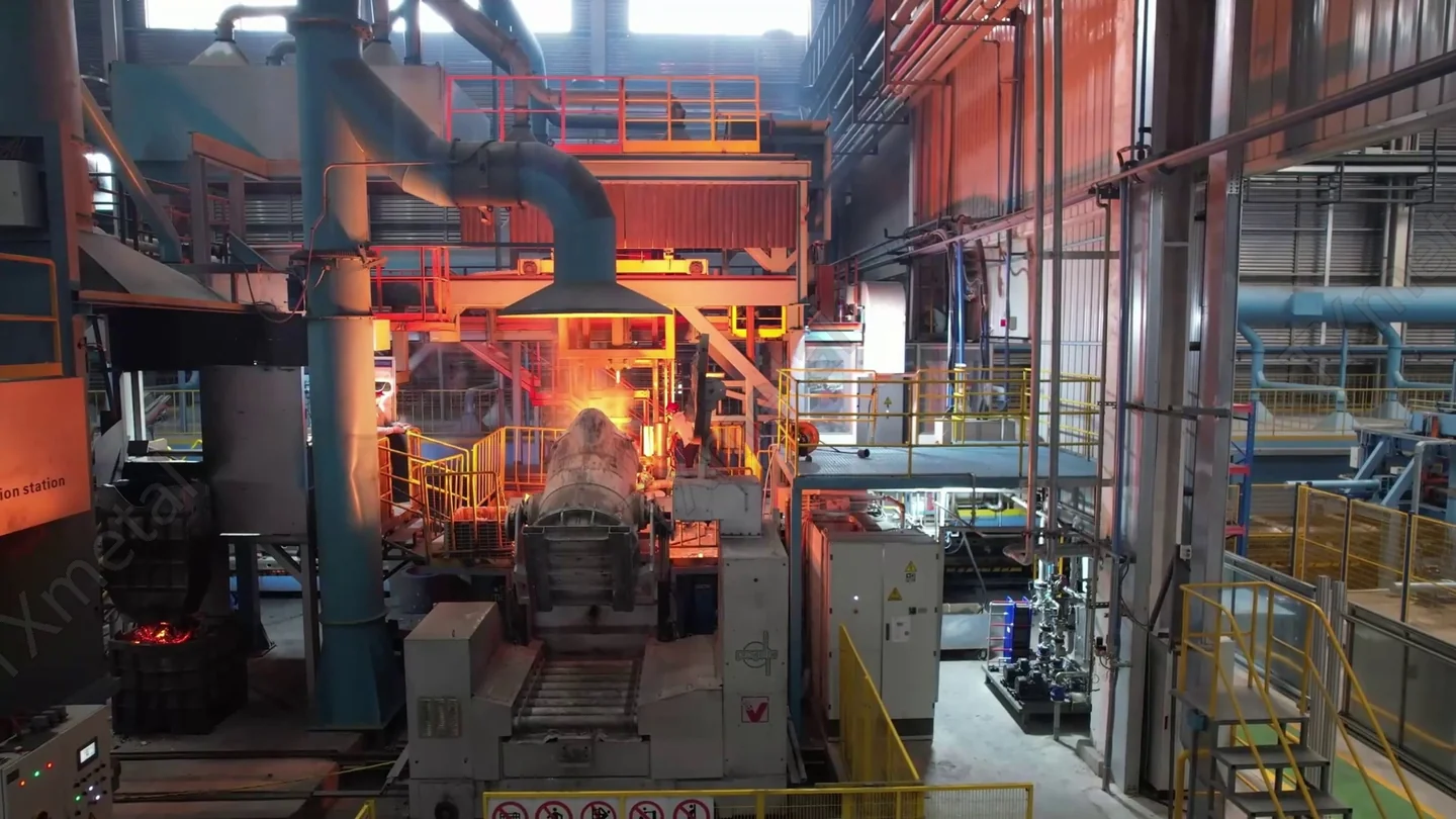 Automatic tilting ladle pouring station for gray iron, ductile iron, and ADI casting production in a modern foundry.