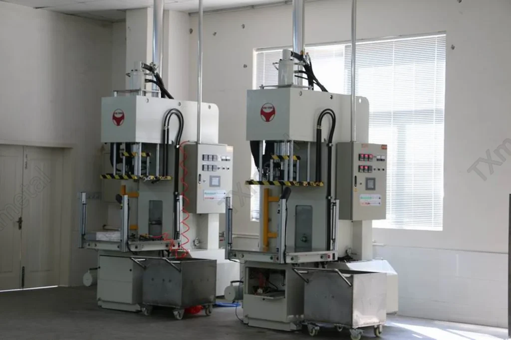 Hydraulic press machine for tensile and compression strength testing of cast iron and ductile iron castings.