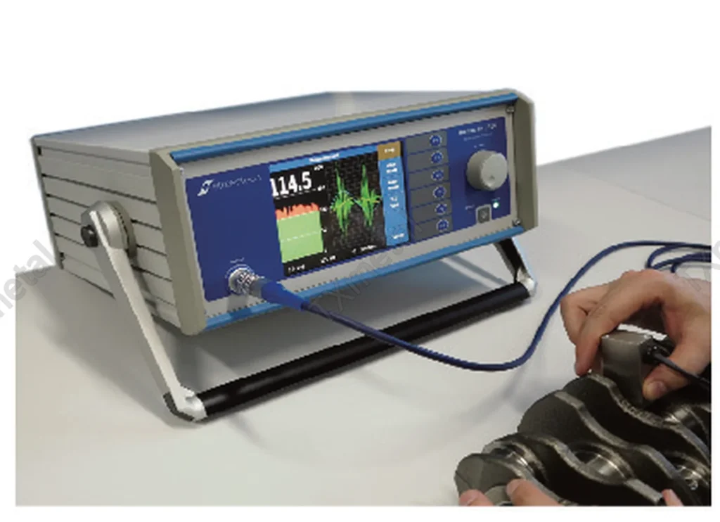 Ultrasonic flaw detector inspecting cast iron and ductile iron components for internal defects.